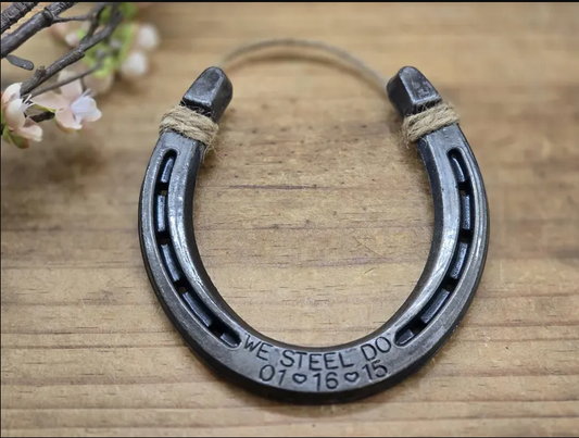 Real horseshoe hand-stamped with WE STEEL DO plus a personalized anniversary date ideal for 11 year anniversaries.