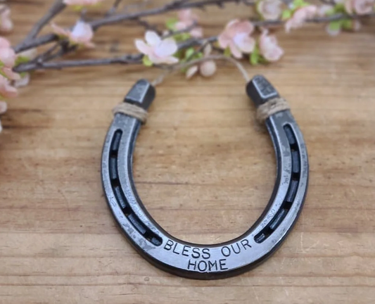 Horseshoe wall decor stamped with Bless Our home