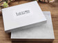 Lucky American small white gift box. This is an add-on option.