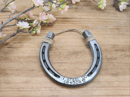 Real horseshoe stamped with 'I STEEL DO' and the anniversary date along the bottom. Ideal for 11 year anniversaries.