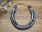 Real horseshoe hand-stamped with WE STEEL DO plus a personalized anniversary date ideal for 11 year anniversaries.