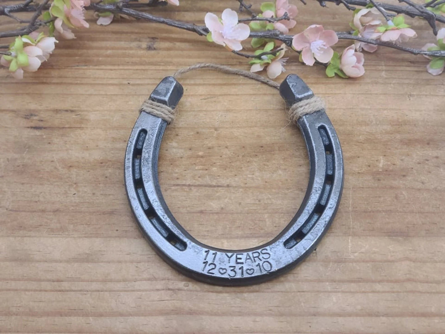 Horseshoe wall decor personalized with wedding date for 11-year anniversary