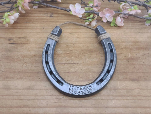 Horseshoe wall decor personalized with wedding date for 11-year anniversary